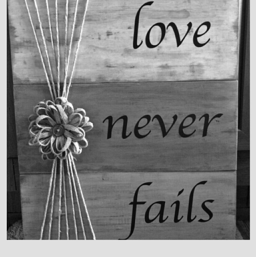 Love a never fails sign